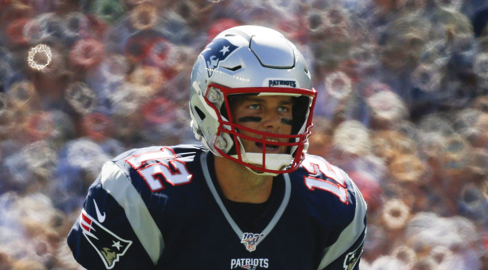 epa08365871 (FILE) New England Patriots quarterback Tom Brady calls a play against the New York Jets during the first half of the game at Gillette Stadium in Foxborough, Massachusetts, USA 22 September 2019, re-issued 26 April 2020. To help in the coronacrisis Brady is auctioning an "adventure package" including free entrance for the first match of his new team Tampa Bay Buccaneers, a jersey and shoes from this game, a diner and a work-out together. The starting offer has been 50,000 US $, around 46,000 Euro, after 12 hours the highest offer reached 110,000 Euro. The auction runs for 2 weeks.  EPA/CJ GUNTHER