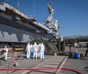 epa08367136 A handout photo made available by the French Defense Ministry on 16 April 2020 shows officers getting prepared to work on cleaning and disinfecting the French nuclear aircraft carrier Charles De Gaulle in Toulon, France, 15 April 2020. The French Defense Minister announced on 15 April 2020 that 668 people tested positive for the coronavirus in the aircraft carrier Charles de Gaulle.  EPA/BENOIT EMILE  HANDOUT EDITORIAL USE ONLY/NO SALES