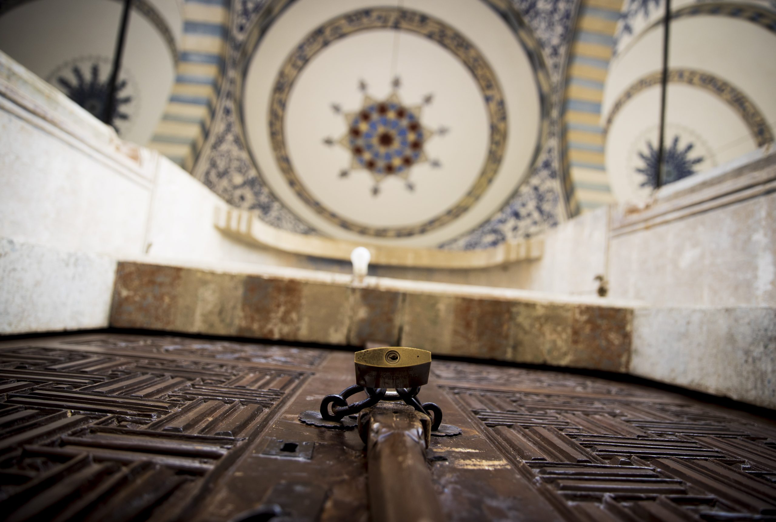 epa08380351 View of the entrance of the Imperial Mosque, built in 1461 by Sultan Mehmet II Fatih, locked down as a measure against the spread of the coronavirus in Pristina, Kosovo, 23 April 2020. Muslims around the world prepare to celebrate the holy month of Ramadan, by praying during the night time and abstaining from eating, drinking, and sexual acts during the period between sunrise and sunset. Ramadan is the ninth month in the Islamic calendar and it is believed that the revelation of the first verse in Koran was during its last 10 nights.  EPA/VALDRIN XHEMAJ