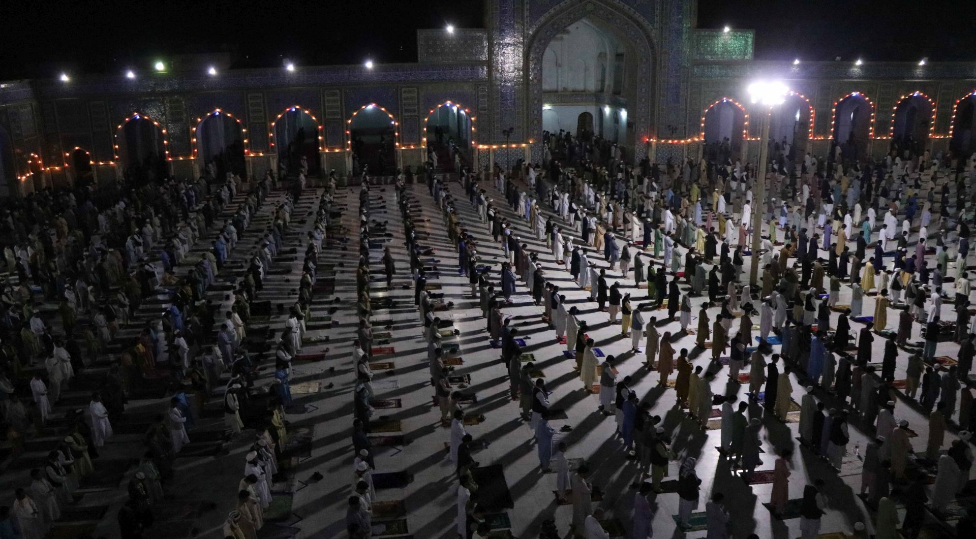 epa08384636 Muslims offer special taraveeh prayers during the Muslim holy month of Ramadan amid lockdown due to the ongoing coronavirus COVID-19 pandemic, in Herat, Afghanistan, 25 April 2020. Muslims around the world prepare to celebrate the holy month of Ramadan, by praying during the night time and abstaining from eating, drinking, and sexual acts during the period between sunrise and sunset. Ramadan is the ninth month in the Islamic calendar and it is believed that the revelation of the first verse in Koran was during its last 10 nights  EPA/JALIL REZAYEE