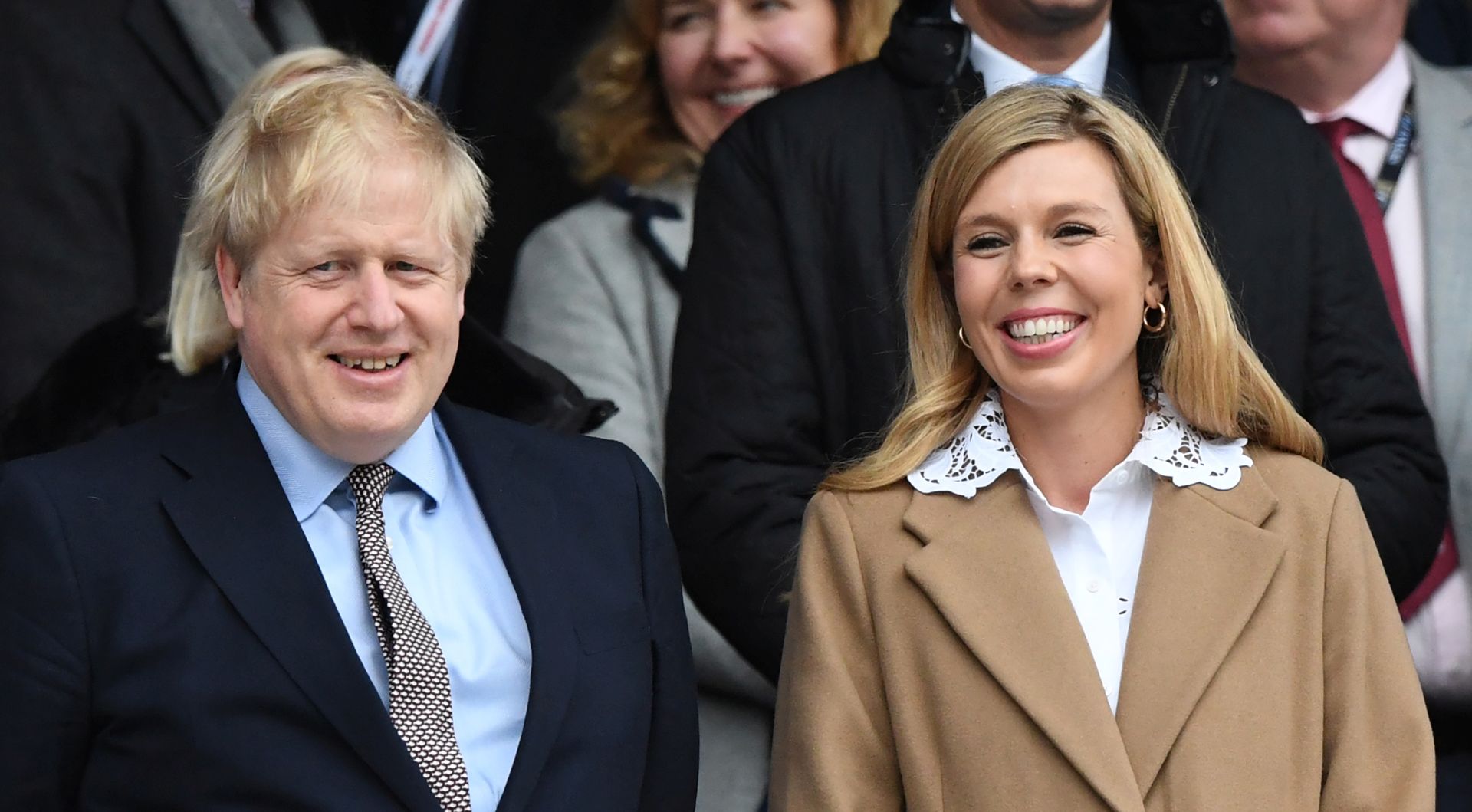 epa08390710 (FILE) British Prime Minister, Boris Johnson (L) and his partner Carrie Symonds (R) during the Six Nations rugby match between England and Wales held at Twickenham stadium in London, Britain, 07 March 2020 (reissued 29 April 2020). British Prime Minister Boris Johnson and his partner Carrie Symonds announced on 29 April 2020 the birth of their baby son.  EPA/FACUNDO ARRIZABALAGA *** Local Caption *** 55935636