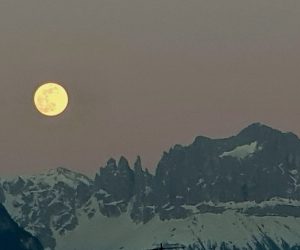 epa08349030 The most spectacular supermoon of 2020 called Super Pink Moon shines over the Catinaccio mountain, near Bozen, northern Italy, 07 April 2020. The full Moon is in fact closer than usual and appears a little larger and 15 percent brighter. It is the third, after those of the previous two months, but it's even more super because it's even closer.  EPA/GIULIANO RIGHI