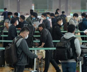 epa08390610 A group of South Korean businessmen wait at check-in counters at Incheon airport, west of Seoul, on April 29, 2020, before their departure for Vietnam. The Southeast Asian country has granted 340 South Korean business travelers exemptions to its coronavirus entry ban. The exemptions came amid Seoul's stepped-up diplomacy to persuade foreign countries to allow essential overseas trips by businessmen, as part of a broader effort to limit the economic repercussions of the COVID-19 pandemic  EPA/YONHAP SOUTH KOREA OUT
