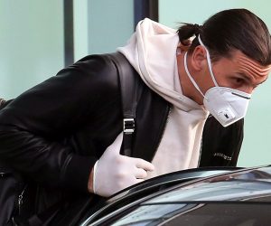 epa08415593 AC Milan's Swedish striker Zlatan Ibrahimovic wearing a protective face mask arrives at Malpensa airport in Milan, Italy, 11 May 2020, amid the ongoing coronavirus COVID-19 pandemic. Ibrahimovic will stay under quarantine at the Milanello sports center, where he will train in individual mode in the absence of his teammates. Ibrahimovic has spent the past two months in Sweden, where he trained at Swedish soccer club Hammarby IF, which he co-owns.  EPA/MATTEO BAZZI