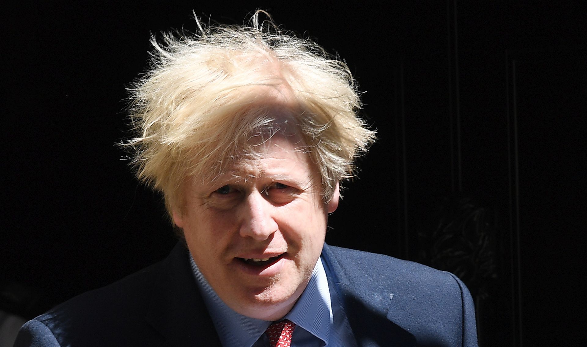 epa08433469 British Prime Minister Boris Johnson departs No. 10 Downing Street in London, Britain, 20 May 2020. As the United Kingdom starts easing its lockdown restrictions, many workers across the country are facing the dilemma of whether returning to their workplaces is safe for them or not. Meanwhile, the UK's economy has suffered a 2-percent fall, its worst decline since the 2008 financial crash, due to the global effects of the ongoing pandemic of the COVID-19 disease caused by the SARS-CoV-2 coronavirus.  EPA/ANDY RAIN