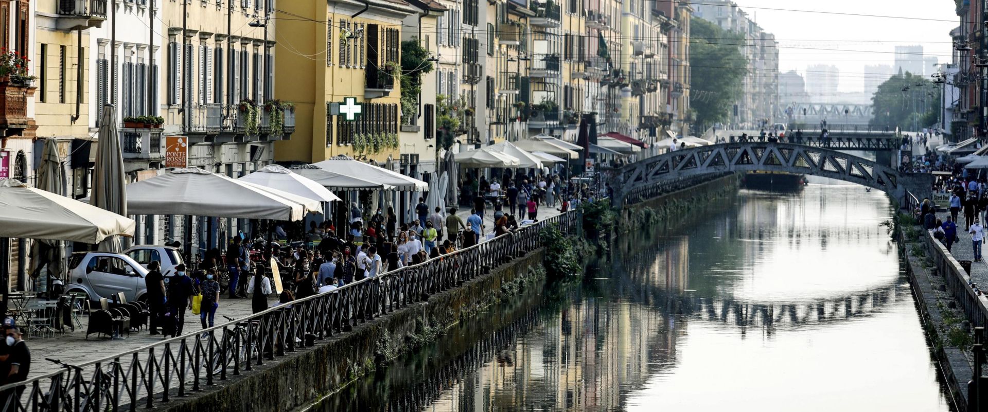 epa08438399 The Milanese nightlife along the Navigli and the Darsena during phase 2 of the Coronavirus emergency, in Milan, northern Italy, 22 May 2020. It is not time for youth street parties known as 'movida' or else the coronavirus infection curve may start heading back up again, Italian Premier Giuseppe Conte said Wednesday 20 May. Italy is gradually easing lockdown measures implemented to stem the spread of the SARS-CoV-2 coronavirus that causes the COVID-19 disease.  EPA/MOURAD BALTI TOUATI