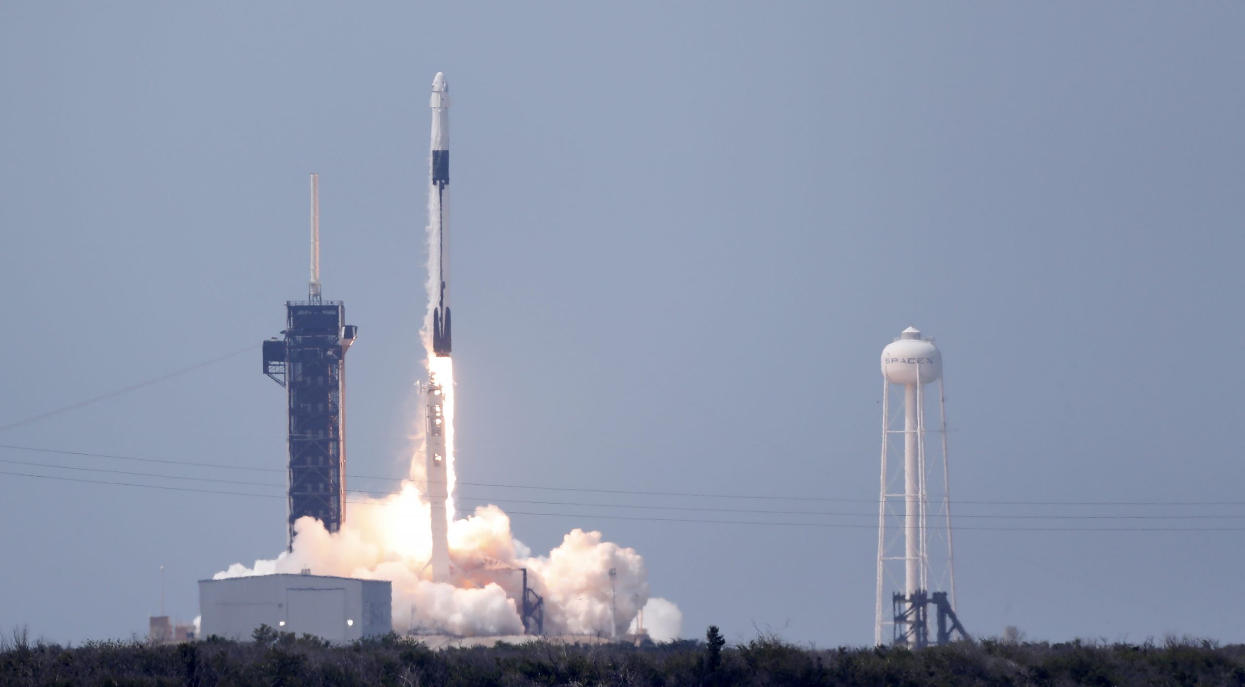 epa08454765 The manned SpaceX Falcon 9 Crew Dragon Demo-2 mission lifts off from Launch Complex 39A at the Kennedy Space Center, Florida, USA, 30 May 2020. NASA astronauts Robert Behnken and Douglas Hurley are aboard the Crew Dragon spacecraft which is scheduled to dock with the International Space Station. The launch is the first manned space flight from US soil since 2011.  EPA/ERIK S. LESSER