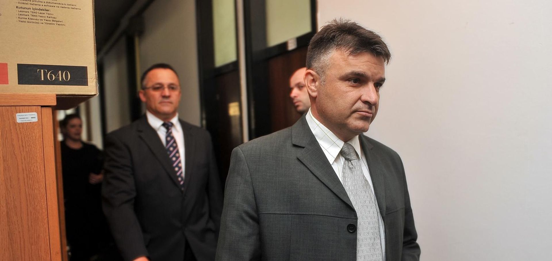 03.05.2011., Ulica brace Radic, Varazdin - Luka Markesic, Zdenko Radic, Zoran Maras i Ivan Orlovic, optuzenici za pomaganje u ratnom zlocinu u Bjelovaru, ulaze u sudnicu. 
Photo: Marko Jurinec/PIXSELL
