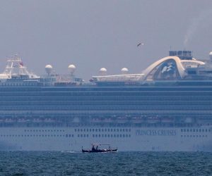 Princess Cruises' Ruby Princess cruise ship docks in Manila Bay A fishing boat sails past the Princess Cruises' Ruby Princess cruise ship as it docks in Manila Bay during the coronavirus disease (COVID-19) outbreak, in Cavite City, Philippines, May 7, 2020. REUTERS/Eloisa Lopez ELOISA LOPEZ