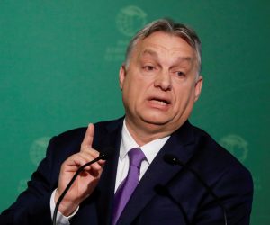 FILE PHOTO: Hungary's PM Orban takes part in an annual business conference in Budapest FILE PHOTO: Hungarian Prime Minister Viktor Orban speaks during a business conference in Budapest, Hungary, March 10, 2020. REUTERS/Bernadett Szabo/File Photo Bernadett Szabo