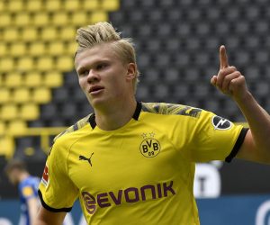 epa08425960 Dortmund's Erling Haaland celebrates after scoring the opening goal during the German Bundesliga soccer match between Borussia Dortmund and Schalke 04 in Dortmund, Germany, 16 May 2020. The German Bundesliga and Second Bundesliga are the first professional leagues to resume the season after the nationwide lockdown due to the ongoing Coronavirus (COVID-19) pandemic. All matches until the end of the season will be played behind closed doors.  EPA/MARTIN MEISSNER / POOL DFL regulations prohibit any use of photographs as image sequences and/or quasi-video.