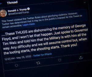 epa08451989 A photograph of a computer screen shows the tweet and the warning that Twitter placed on US President Donald J. Trump's tweet from earlier this morning in Washington, DC USA, 29 May 2020. President Trump's tweet implied that looters in Minneapolis, Minnesota could be shot.  EPA/SHAWN THEW