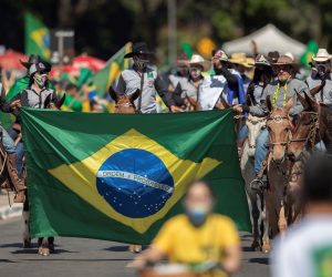 epa08456523 Thousands of supporters of the Brazilian President, Jair Bolsonaro, demonstrate in Brasilia, Brazil, 31 May 2020. Brazilian President Jair Bolsonaro ignored on Sunday the seriousness of COVID-19, which already leaves almost 30 thousand deaths in the country, and attended a demonstration with thousands of people. The event took place at the gates of the Planalto Presidential Palace, and as has happened in demonstrations that 'Bolsonarism' held on recent Sundays, the people protested against Congress and the Supreme Court, which according to supporters of the extreme right's leader 'conspire' against the Government.  EPA/Joedson Alves