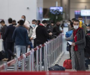 epa08457591 Passengers wearing face masks wait on line for check in for their Turkish Airlines flights after resuming domestic flights in Istanbul Airport, Istanbul, Turkey 01 June 2020. Turkey re-opens restaurants, cafes, parks, beaches, lifts inter-city travel bans as the country eases coronavirus restrictions measures amid the ongoing pandemic of the COVID-19 disease caused by the SARS-CoV-2 coronavirus on 01 June.  EPA/TOLGA BOZOGLU