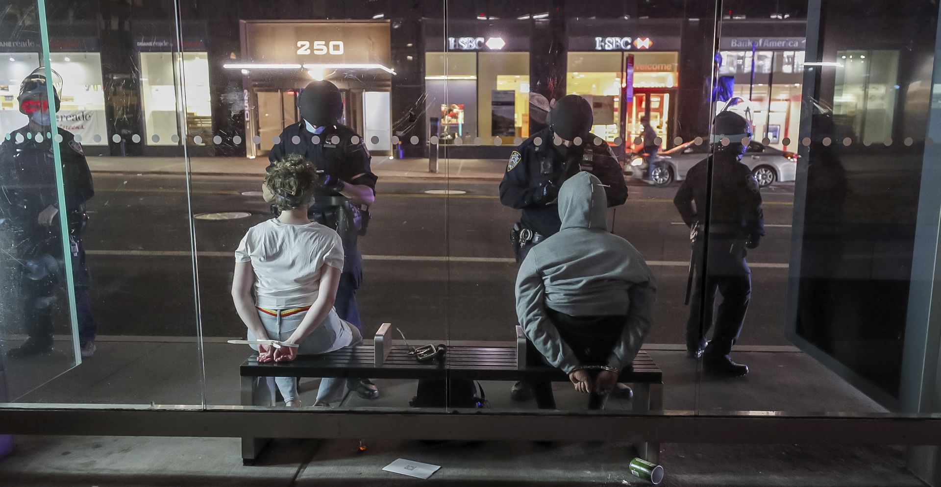 epa08459440 Officers with the New York Police Department detain suspected looters in Manhattan in response to the Minnesota arrest of George Floyd, who later died in police custody, in New York, New York, USA, 01 June 2020. A bystander's video posted online on 25 May, appeared to show George Floyd, 46, pleading with arresting officers that he couldn't breathe as an officer knelt on his neck. The unarmed black man later died in police custody.  EPA/JUSTIN LANE