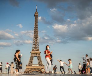 epaselect epa08461746 People dance to music at the Trocadero Human Rights Plaza near the Eiffel Tower in Paris, France, 02 June 2020. France has started a gradual lifting of COVID-19 lockdown restrictions in an effort to restart its economy and help people get back to their daily routines. The country reopened its bars and restaurants after two months of nationwide restrictions due to the coronavirus outbreak.  EPA/MOHAMMED BADRA