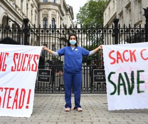 epa08462478 Nurses protests against the lockdown breach of Special Advisor Dominic Cummings outside 10 Downing Street in London, Britain, 03 June, 2020. Cummings broke lockdown regulations in April but has been backed by Prime Minister Boris Johnson. Calls for Cummings's resignation have increased since news broke the Cummings violated lockdown regulations when he and his wife - both suspected of showing Covid-19 symptoms - travelled across the country to self-isolate at a family's property.  EPA/ANDY RAIN