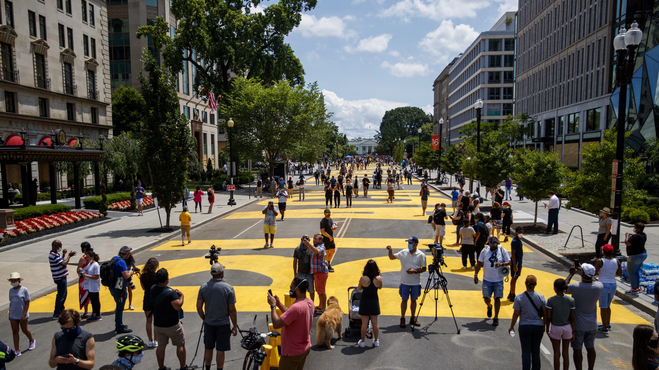 epa08467532 'Black Lives Matter' is painted on 16th Street near the White House, where there have been of seven days of protests over the death of George Floyd, who died in police custody, in Washington, DC, USA, 05 June 2020. Earlier in the day DC Mayor Muriel Bowser renamed that section of 16th Street Black Lives Matter Plaza.  EPA/SHAWN THEW