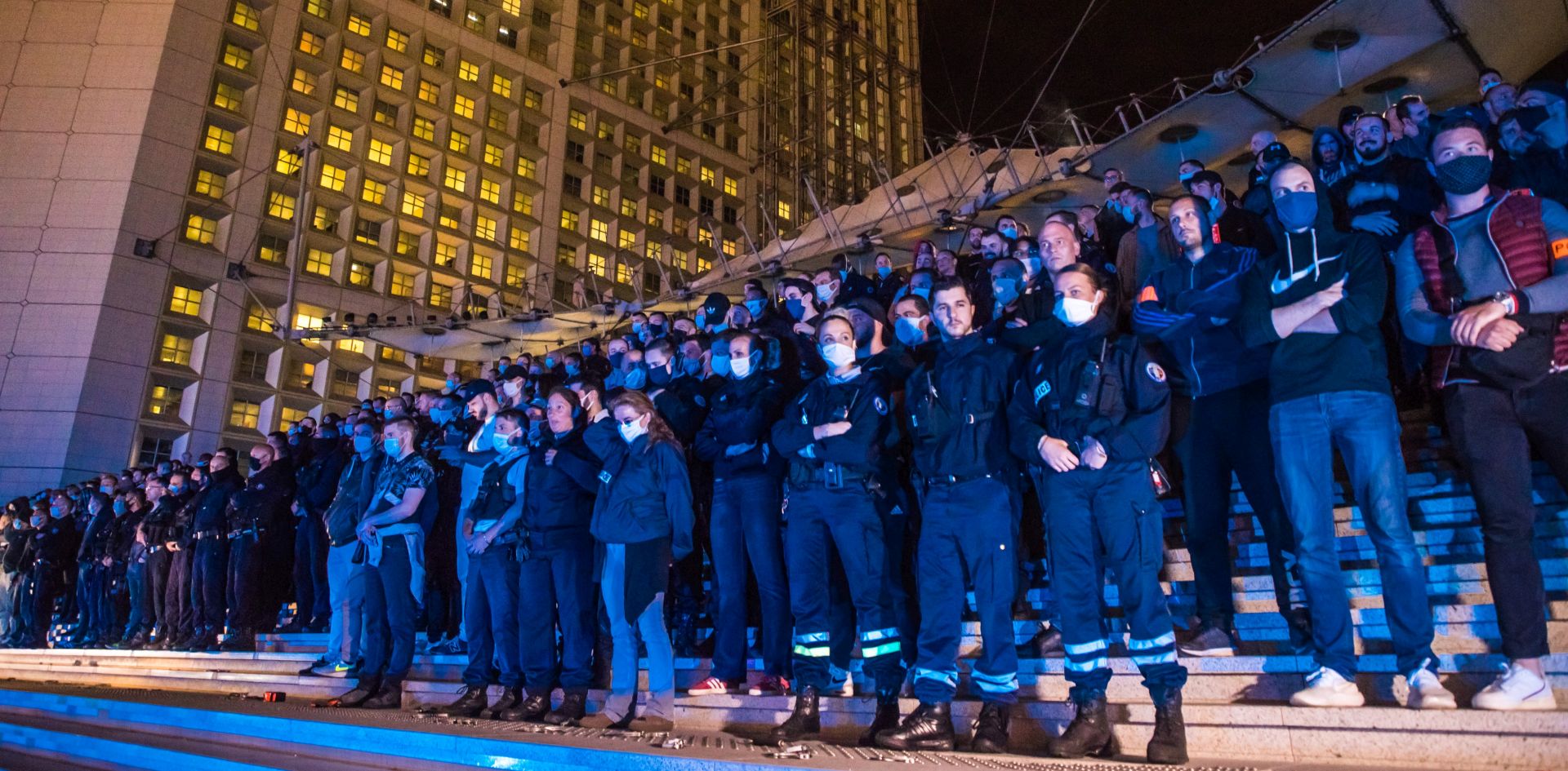 epa08487436 French Police officers gather at La Defense, Paris business district, to protest against French Interior Minister Christophe Castaner's reforms, including ditching a controversial chokehold method of arrest, in Paris, France, 15 June 2020. The police officers gathered to denounce lack of government support as protesters around the world organize protests against police brutality.  EPA/CHRISTOPHE PETIT TESSON