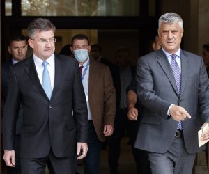 epa08488792 President of the Republic of Kosovo Hashim Thaci (R) and EU Special Representative for the Pristina-Belgrade Dialogue Miroslav Lajcak (L) arrive for a press conference following their meeting in Pristina, Kosovo, 16 June 2020. EU Special Representative Miroslav Lajcak is on three-day official visit in Kosovo.  EPA/VALDRIN XHEMAJ