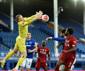 epa08501153 Everton's manager Peter Powell makes a save during the English Premier League soccer match between Everton FC and Liverpool FC in Liverpool, Britain, 21 June 2020.  EPA/PETER POWELL / NMC / EPA POOL EDITORIAL USE ONLY. No use with unauthorized audio, video, data, fixture lists, club/league logos or 'live' services. Online in-match use limited to 120 images, no video emulation. No use in betting, games or single club/league/player publications.