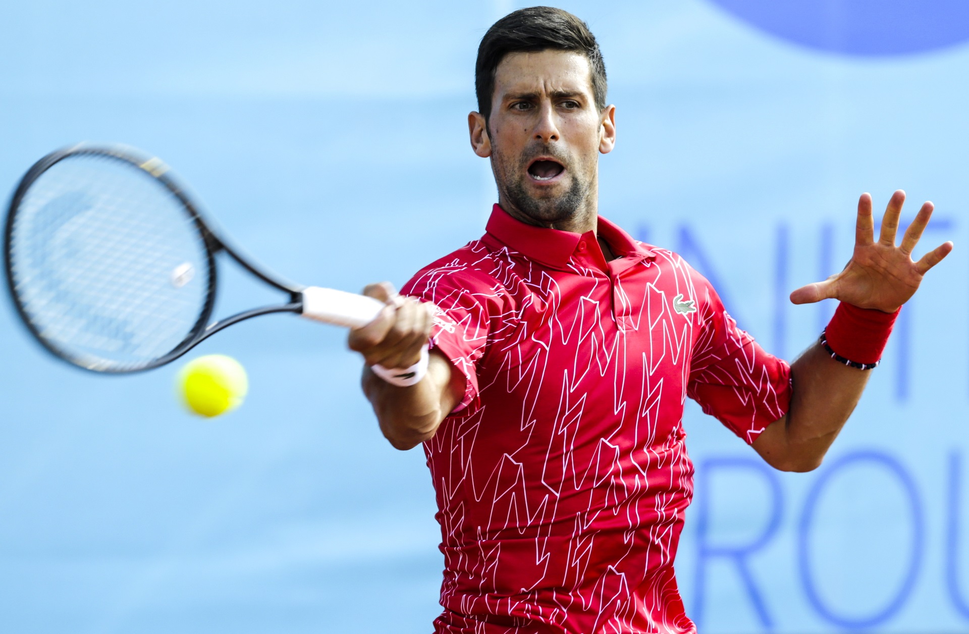 epa08503754 (FILE) - Novak Djokovic of Serbia plays a forehand against Viktor Troicki of Serbia during their match for the Adria Tour tennis tournament in Belgrade, Serbia, 13 June 2020 (re-issued 23 June 2020). Djokovic released a statement on 23 June 2020 that he tested positiv for Covid-19.  EPA/ANDREJ CUKIC
