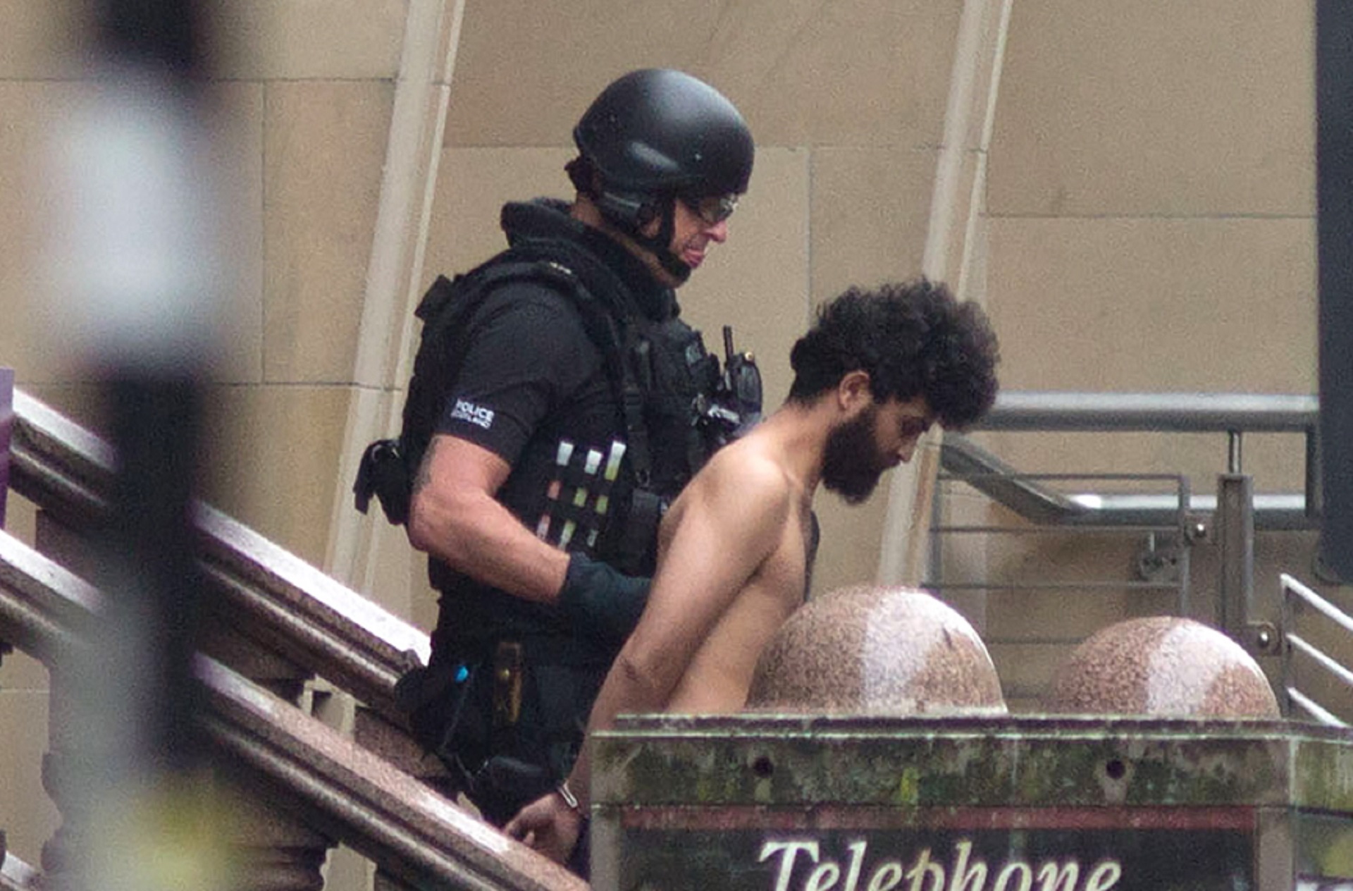 epa08510874 Police and emergency responders attend the scene of a stabbing incident in downtown Glasgow, Scotland, Britain, 26 June 2020. According to media reports, police have shot an attacker who had allegedly stabbed a number of people at a hotel.  EPA/Stringer