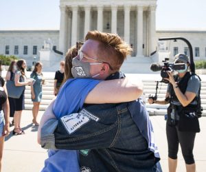 epa08516170 Anti-abortion protesters embrace each other outside the Supreme Court of the United States after it struck down a controversial Louisiana state abortion law in Washington, DC, USA, 29 June 2020. Chief Justice John Roberts voted with the top court's four liberal justices in a 5-4 ruling that declared the law – which was passed in 2014 and required physicians to have active admitting privileges at a hospital near the facility where they provide abortions – unconstitutional. SCOTUS has yet to rule on another high-profile case involving the disclosure of President Donald Trump's financial records and tax returns.  EPA/JIM LO SCALZO