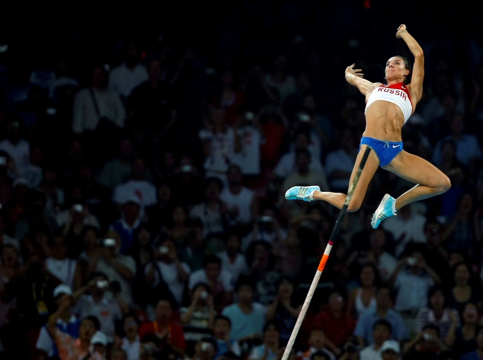 FILE PHOTO: Yelena Isinbayeva of Russia competes during the women's pole vault final at the Beijing 2008 Olympic Games FILE PHOTO: Yelena Isinbayeva of Russia competes during the women's pole vault final of the athletics competition in the National Stadium at the Beijing 2008 Olympic Games in China August 18, 2008. REUTERS/Mike Blake/File Photo Mike Blake
