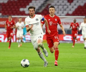 DFB Cup - Semi Final - Bayern Munich v Eintracht Frankfurt Soccer Football - DFB Cup - Semi Final - Bayern Munich v Eintracht Frankfurt - Allianz Arena, Munich, Germany - June 10, 2020   Bayern Munich's Ivan Perisic in action with Eintracht Frankfurt's David Abraham, as play resumes behind closed doors following the outbreak of the coronavirus disease (COVID-19)  REUTERS/Kai Pfaffenbach/Pool    DFB regulations prohibit any use of photographs as image sequences and/or quasi-video KAI PFAFFENBACH