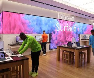 FILE PHOTO: Employees work at Microsoft's new Oxford Circus store ahead of its opening in London FILE PHOTO: Employees work at Microsoft's new Oxford Circus store ahead of its opening in London, Britain July 9, 2019.   REUTERS/Simon Dawson/File Photo  GLOBAL BUSINESS WEEK AHEAD Simon Dawson