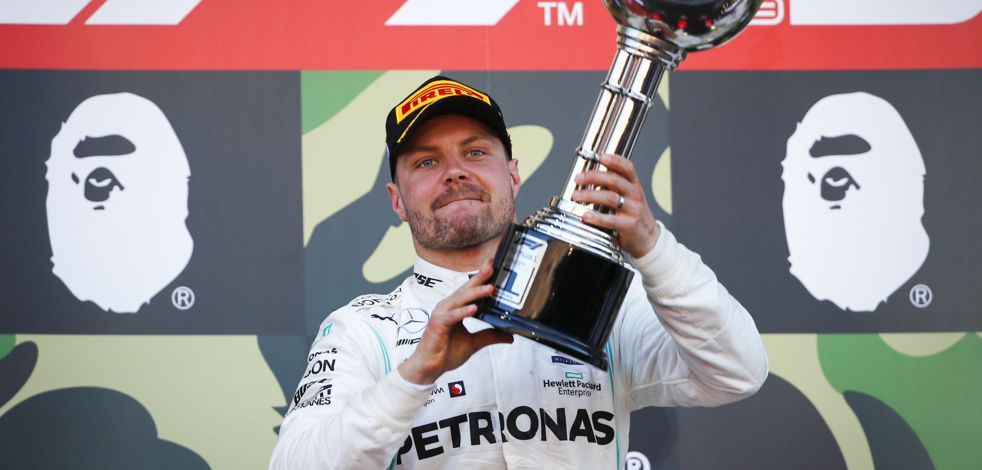 epa08480439 (FILE) -  Finnish Formula One driver Valtteri Bottas of Mercedes AMG GP celebrates on the podium with his trophy after winning the Japanese Formula One Grand Prix in Suzuka, Japan, 13 October 2019 (re-issued on 12 June 2020). On 12 June 2020 the FIA (Federation Internationale de l'Automobile) announced that the 2020 Formula One Grand Prix of Japan, as well of the Azerbaijan Grand Prix and Singapore Grand Prix have been cancelled 'As a result of the ongoing challenges presented by COVID-19'.  EPA/DIEGO AZUBEL *** Local Caption *** 55544199