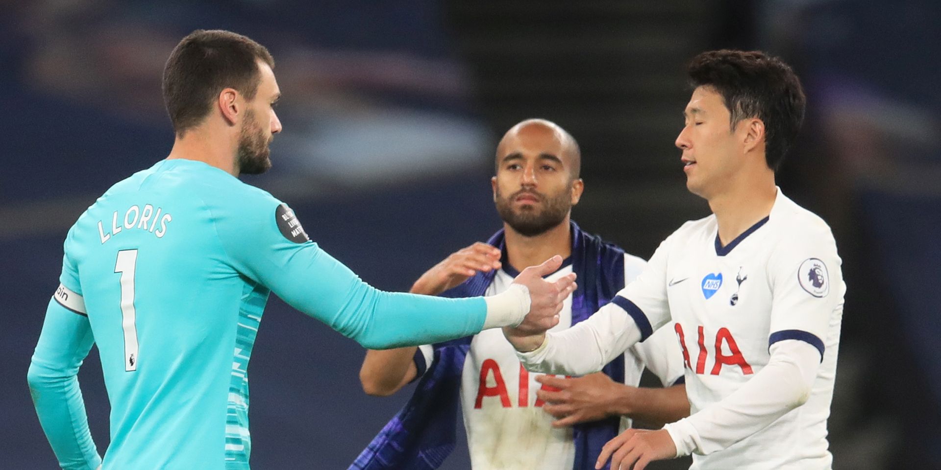 epa08531412 Goalkeeper Hugo Lloris (L) of Tottenham and teammates Son Heung-Min (R) and Lucas Moura celebrate after the English Premier League match between Tottenham Hotspur and Everton in London, Britain, 06 July 2020.  Tottenham won 1-0.  EPA/Adam Davy/NMC/Pool EDITORIAL USE ONLY. No use with unauthorized audio, video, data, fixture lists, club/league logos or 'live' services. Online in-match use limited to 120 images, no video emulation. No use in betting, games or single club/league/player publications.