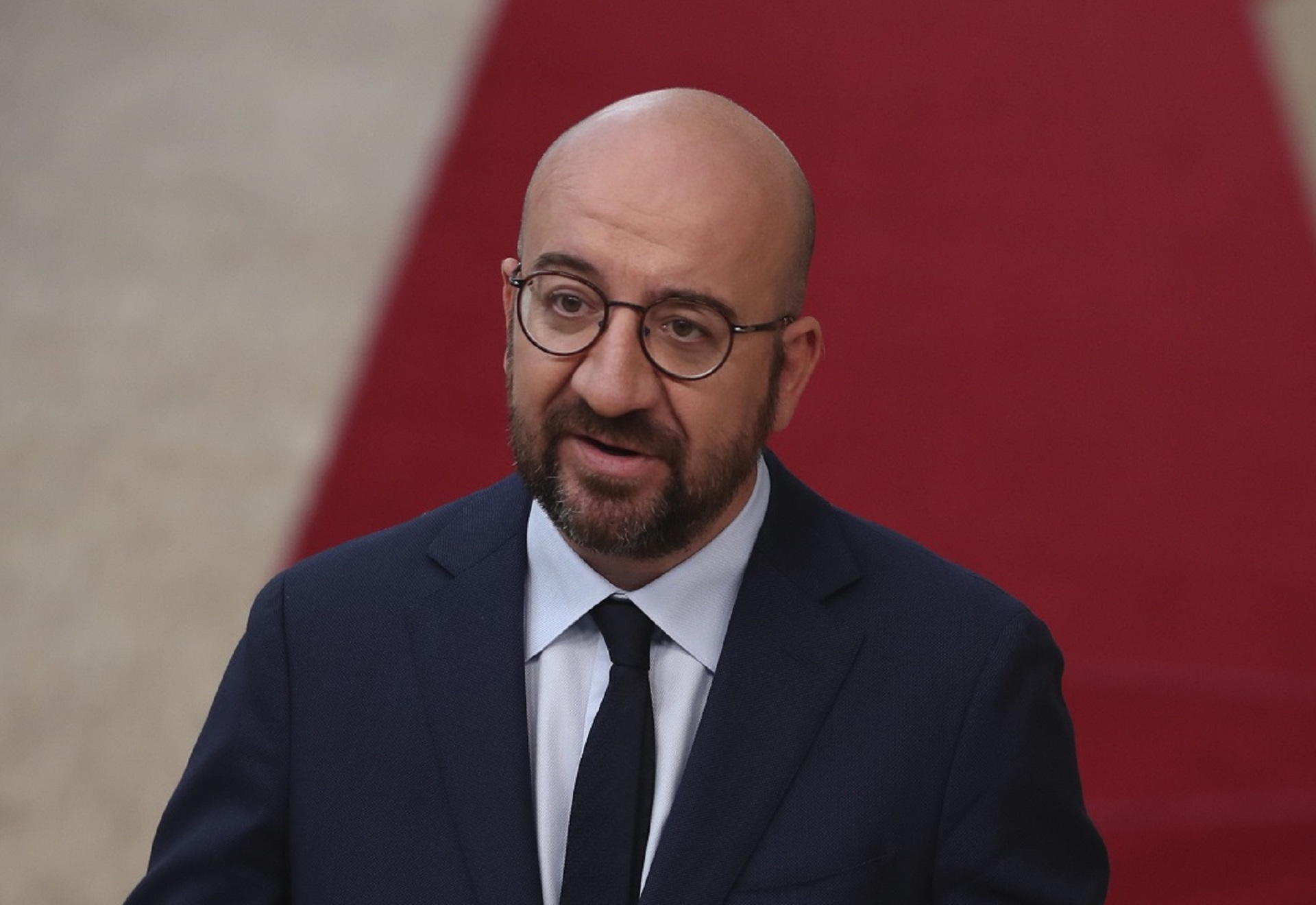 epa08551164 European Council President Charles Michel makes a statement as he arrives for an EU summit at the European Council building in Brussels, Belgium, 17 July 2020. European Union nations leaders meet face-to-face for the first time since February to discuss plans responding to coronavirus crisis and new long-term EU budget at the special European Council on 17 and 18 July.  EPA/FRANCISCO SECO / POOL