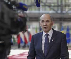 epa08553148 Slovenia's Prime Minister Janez Jansaarrives speaks to the media during the second day of the European Council in Brussels, Belgium, 18 July 2020. European Union nations leaders meet face-to-face for the first time since February to discuss plans responding to the coronavirus crisis and new long-term EU budget at the special European Council on 17 and 18 July.  EPA/STEPHANIE LECOCQ