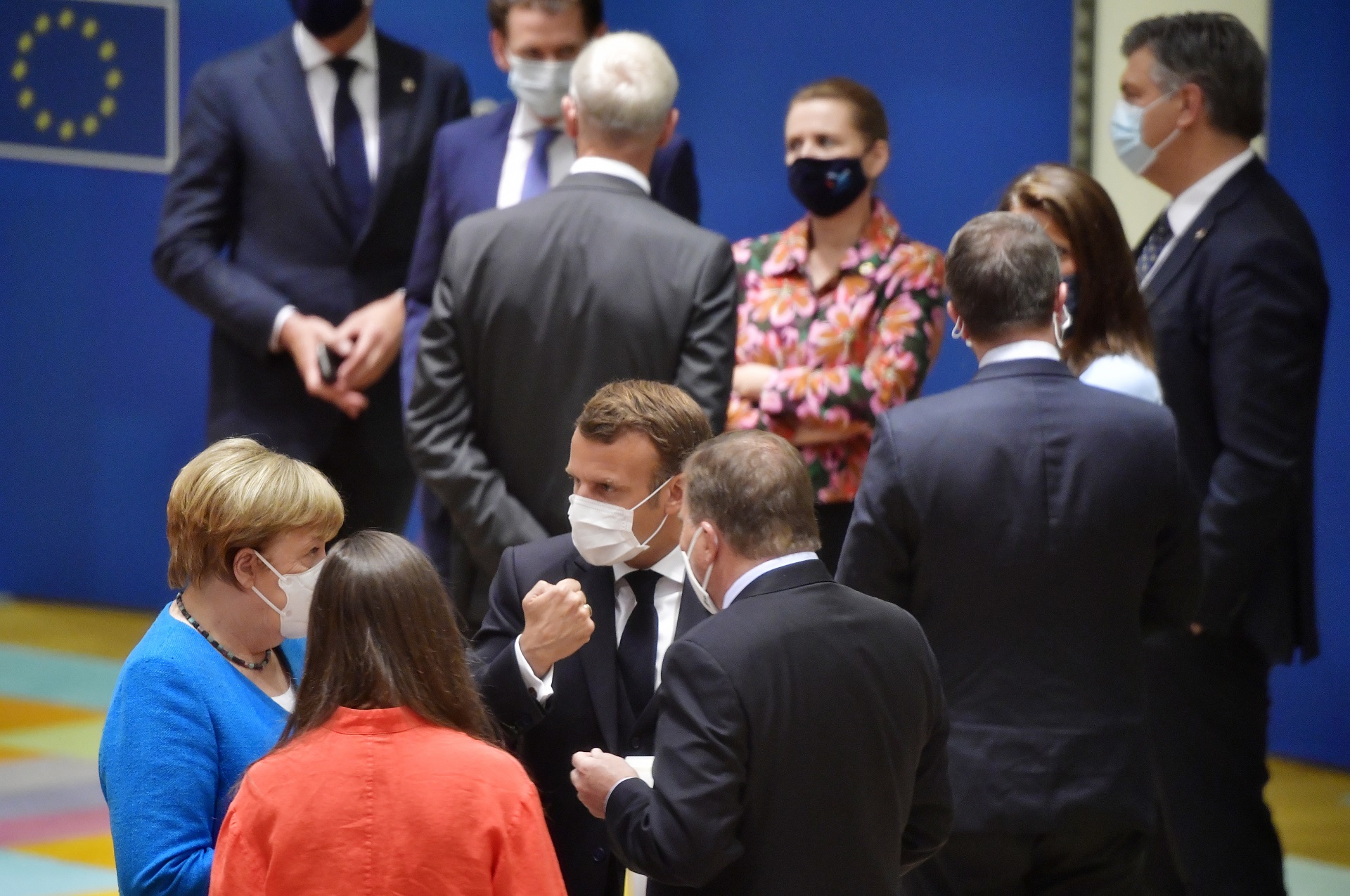 epa08553222 (L-R, front) German Chancellor Angela Merkel, France's President Emmanuel Macron, Finland's Prime Minister Sanna Marin and Sweden's Prime Minister Stefan Lofven at the start of the second day of the European Council in Brussels, Belgium, 18 July 2020. European Union nations leaders meet face-to-face for the first time since February to discuss plans responding to coronavirus crisis and new long-term EU budget at the special European Council on 17 and 18 July