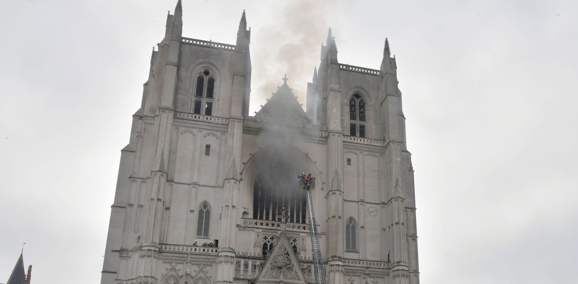epa08553437 Fire fighters brigade work to extinguish the blaze at the Saint Peter and Saint Paul Cathedral, in Nantes, France, 18 July 2020. The blaze that broke inside the gothic cathedral of Nantes 18 has been contained, emergency officials said.   FRANCE OUT / SHUTTERSTOCK OUT
