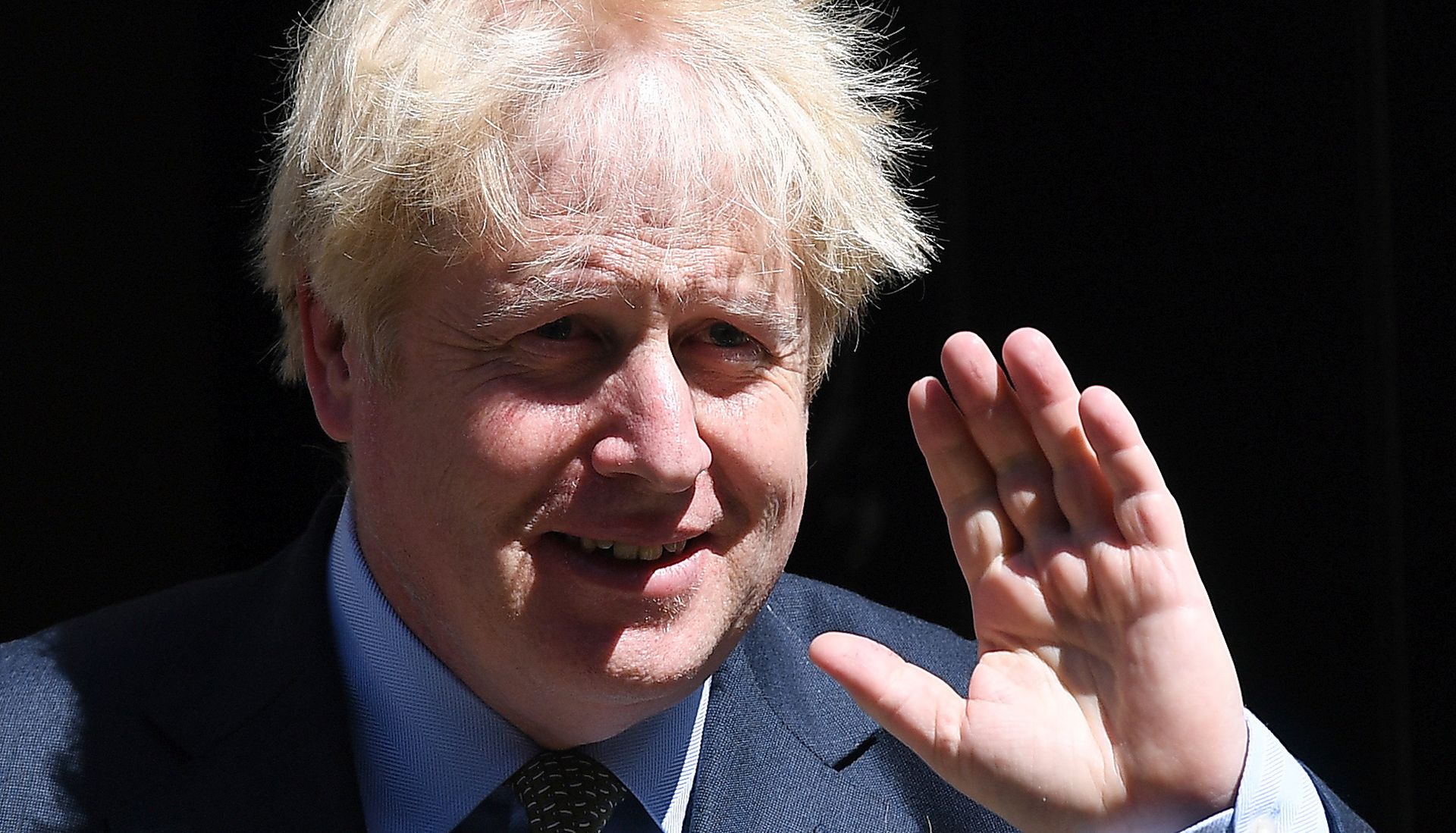 epa08560071 British Prime Minister Boris Johnson departs 10 Downing Street for parliament in London, Britain, 22 July 2020. Johnson is holding his last Prime Minister's Questions ahead of parliaments summer recess.  EPA/ANDY RAIN