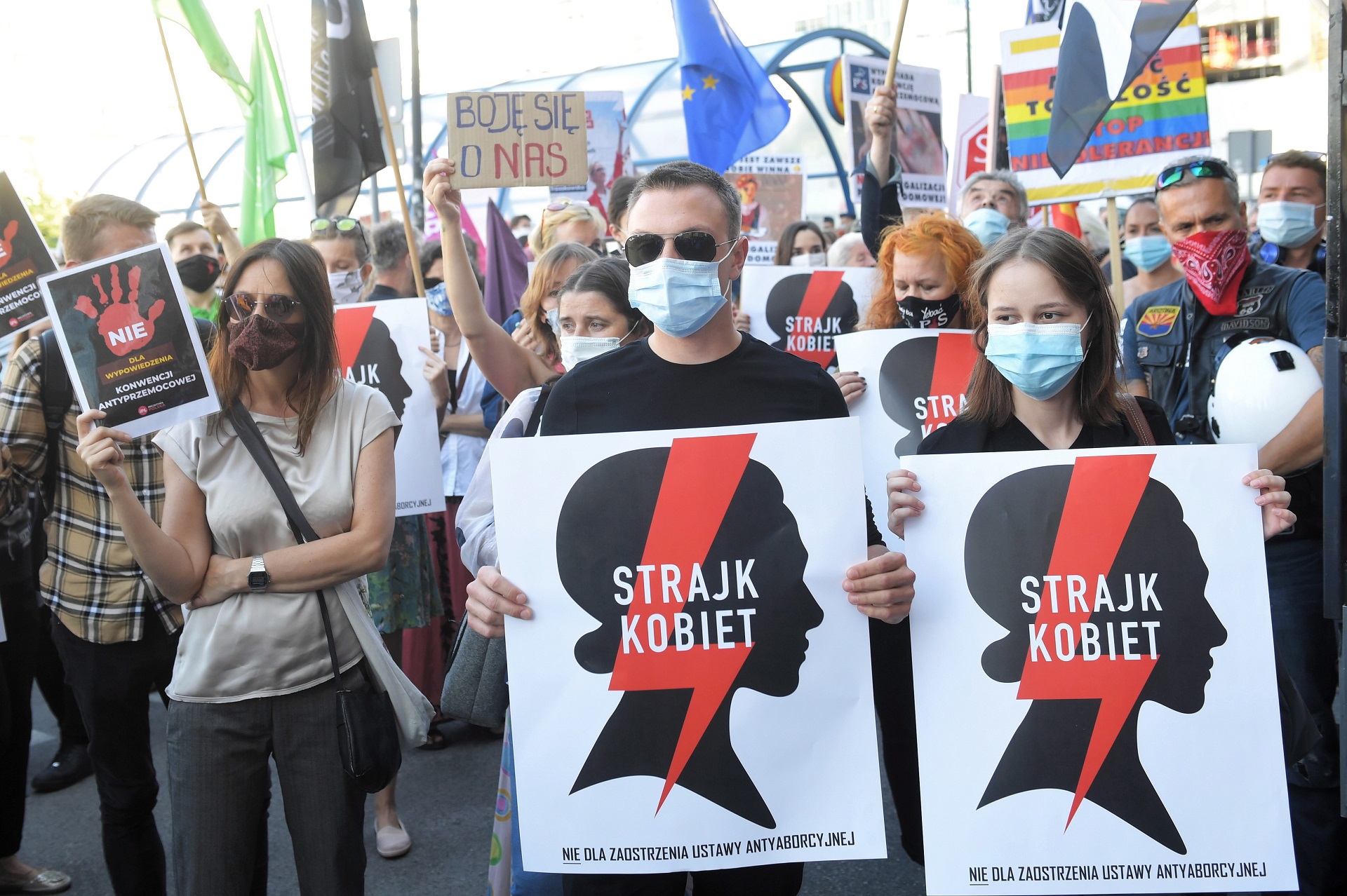 epa08565316 Protesters holding placards 'Women's Strike' take part in a demonstration against government's plans to terminate the Istambul Convention in Warsaw, Poland, 24 July 2020 (issued 25 July 2020). Thousands of protesters went to the streets to protest against Polish government announcement to terminate the Council of Europe Istambul Convention on Action against violence against women and domestic violence.  EPA/RADEK PIETRUSZKA POLAND OUT