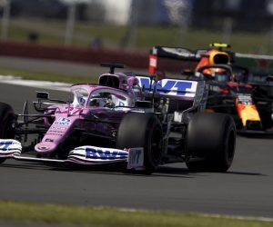 epa08576419 German Formula One driver Nico Hulkenberg of BWT Racing Point (L) in action during the first practice session of the British Formula One Grand Prix in Silverstone, Britain, 31 July 2020.  EPA/Will Oliver / Pool
