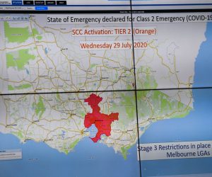 epa08571859 A map is displayed at the Victorian state control center, which is being used for the coronavirus pandemic, in Melbourne, Australia, 29 July 2020.  EPA/JOE ARMAO / POOL AUSTRALIA AND NEW ZEALAND OUT