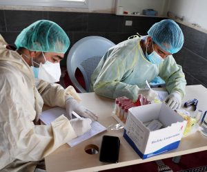 epa08572163 Palestinian medical staff collecting swab samples for COVID-19 testing in the COVID-19 section of Dhahria hospital in the West Bank city of Dhahria, near Hebron, 29 July 2020.  EPA/ABED AL HASHLAMOUN