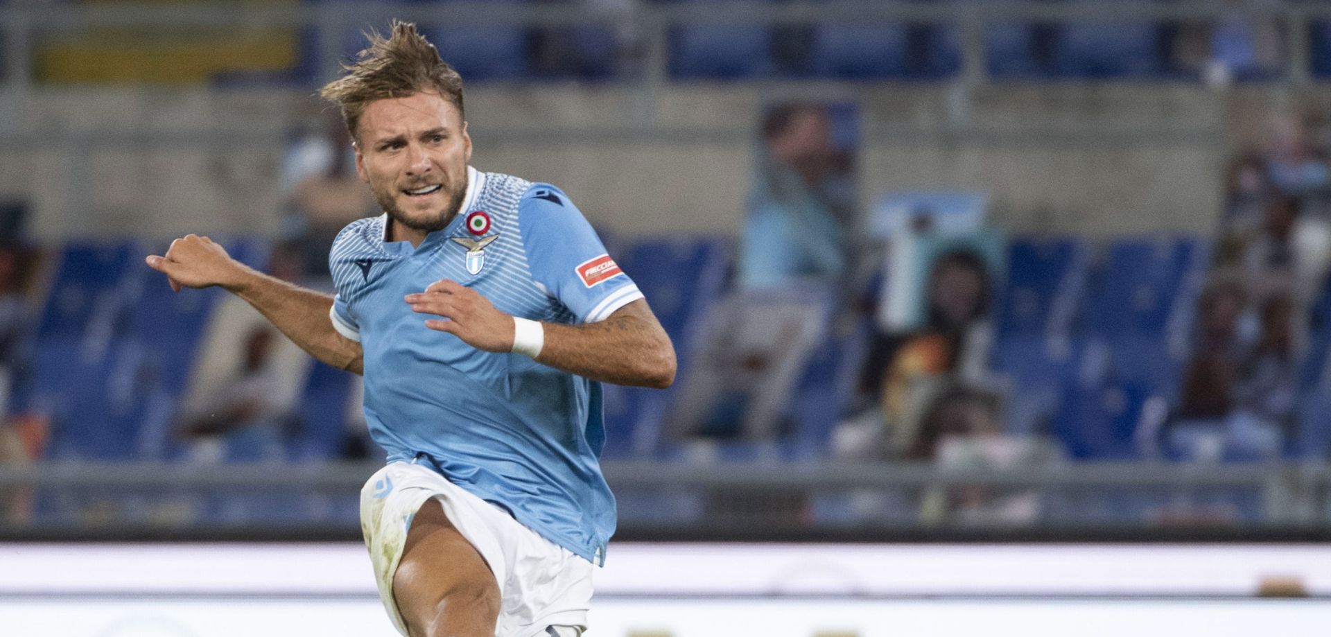 epa08573343 Lazio's Ciro Immobile scores the 2-0 goal  during Italian Serie A soccer match between SS Lazio and Brescia Calcio at Olimpico Stadium in Rome,29 July 2020.  EPA/MAURIZIO BRAMBATTI