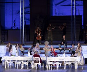 epa08573644 Austrian actor Tobias Moretti as Jedermann (Everyman) (L) and German actress Caroline Peters as Buhlschaft (Paramour) (R) perform on stage during a rehearsal of Hugo von Hofmannsthal's Jedermann (Everyman) at the Domplatz square in Salzburg, Austria, 29 July 2020. The play Jedermann is one of the highlights of the 110th Salzburg festival, which will run shortened form, due to the coronavirus COVID-19 pandemic, from 01 to 30 August 2020.  EPA/CHRISTIAN BRUNA   EDITORIAL USE ONLY/NO SALES