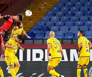 epa08581027 Genoa’s Cristian Romero (L, top) scores during the Italian Serie A soccer match Genoa CFC vs Hellas Verona FC at Luigi Ferraris stadium in Genoa, Italy, 02 August 2020.  EPA/SIMONE ARVEDA