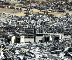epa08586862 A general view of the destroyed port in the aftermath of a massive explosion as search and rescue works for victims continued, in downtown Beirut, Lebanon, 06 August 2020. According to the Lebanese Health Ministry, at least 135 people were killed, and more than 5,000 injured in the blast believed to have been caused by an estimated 2,750 of ammonium nitrate stored in a warehouse. The explosion on 04 August 2020 devastated the port area and parts of the city.  EPA/WAEL HAMZEH