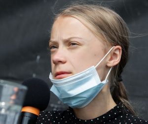 epa08614372 Swedish climate activist Greta Thunberg during a press conference at the House of the World's Cultures (Haus der Kulturen der Welt) in Berlin, Germany, 20 August 2020. German Chancellor Angela Merkel meets a group of climate activists led by Greta Thunberg and Luisa Neubauer at the chancellery to discuss national and international climate protection.  EPA/HAYOUNG JEON