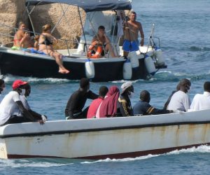 epaselect epa08616258 Migrants land in Lampedusa, Sicily, Italy, 21 August 2020. There are currently 1,400 migrants on Lampedusa after five more landings on the stepping-stone island between Italy and North Africa, sources said 21 August.  EPA/ELIO DESIDERIO