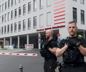 epa08617728 Police guard the entrance of Russian opposition activist as Alexei Navalny (not pictured) arrives at Charite Campus Mitte hospital in Berlin, Germany, 22 August 2020. Navalny was first placed in an hospital in Omsk, Russia, after he felt bad on board of a plane on his way from Tomsk to Moscow. The flight was interrupted and after landing in Omsk Navalny was delivered to hospital with a suspicion on a toxic poisoning. The hospital management agreed on 21 August 2020 to transport Navalny to a German hospital for further treatment.  EPA/HAYOUNG JEON