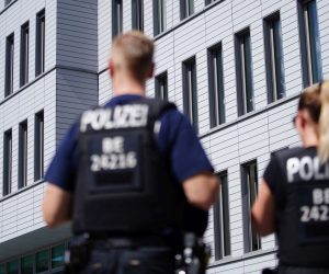 epa08619501 Members of police stand in front of Charite clinic where Russian opposition activist Alexei Navalny (not in the picture) stays for treatment in Berlin, Germany, 23 August 2020. Navalny was first placed in an hospital in Omsk, Russia, after he felt bad on board of a plane on his way from Tomsk to Moscow. The flight was interrupted and after landing in Omsk Navalny was delivered to hospital with a suspicion on a toxic poisoning. The hospital management agreed on 21 August 2020 to transport Navalny to a German hospital for further treatment.  EPA/CLEMENS BILAN